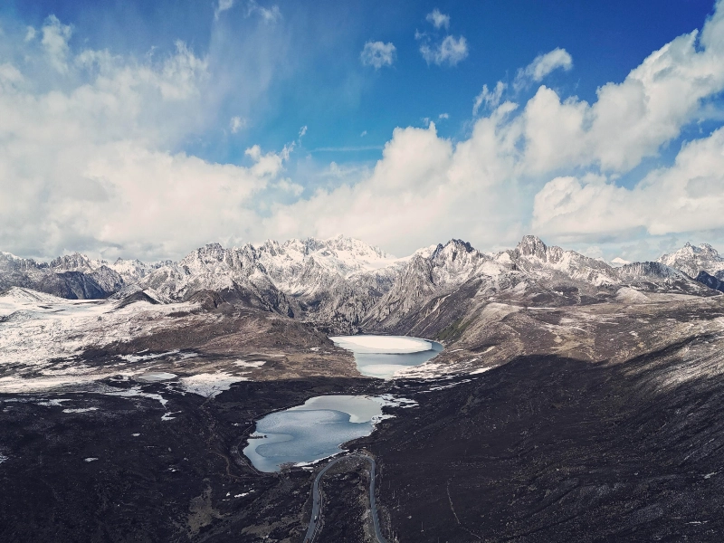 Panoramic Western Sichuan: 7-Day Daocheng Yading, Mount Siguniang & Moshi Park Tour